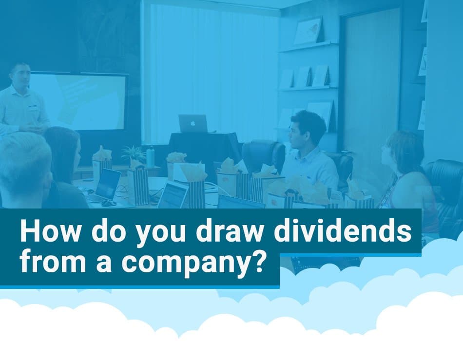 Company directors reviewing dividend withdrawals